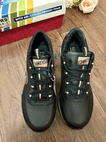Sketchers black leather - black,